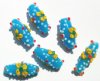 6 23mm Milky Aqua with Yellow Flower Bumpy Oval Beads